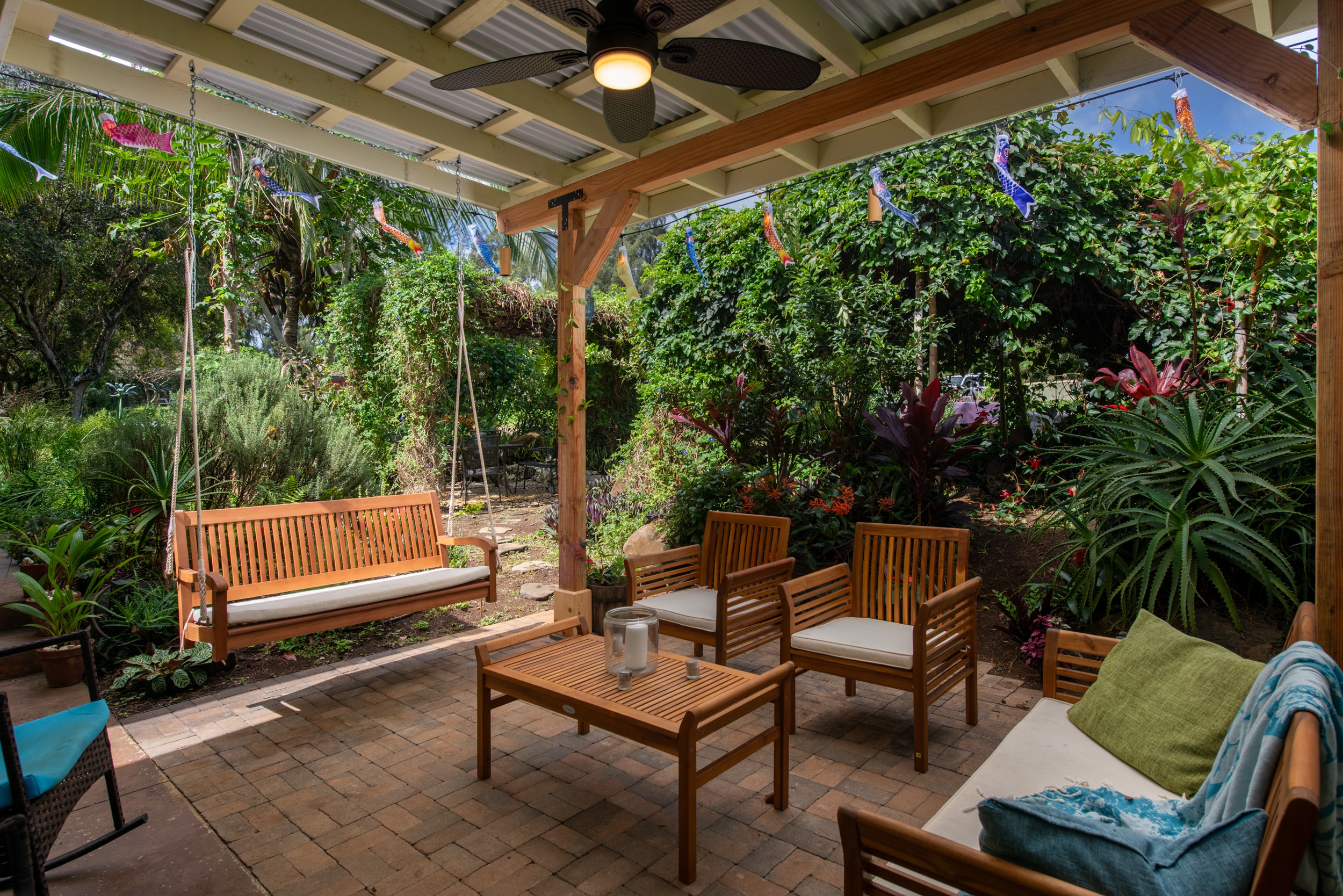 53-4223 Lot 4 Pratt Road Kapaau, HI 96755 - Photo 13 of 30 a backyard of a house with outdoor seating