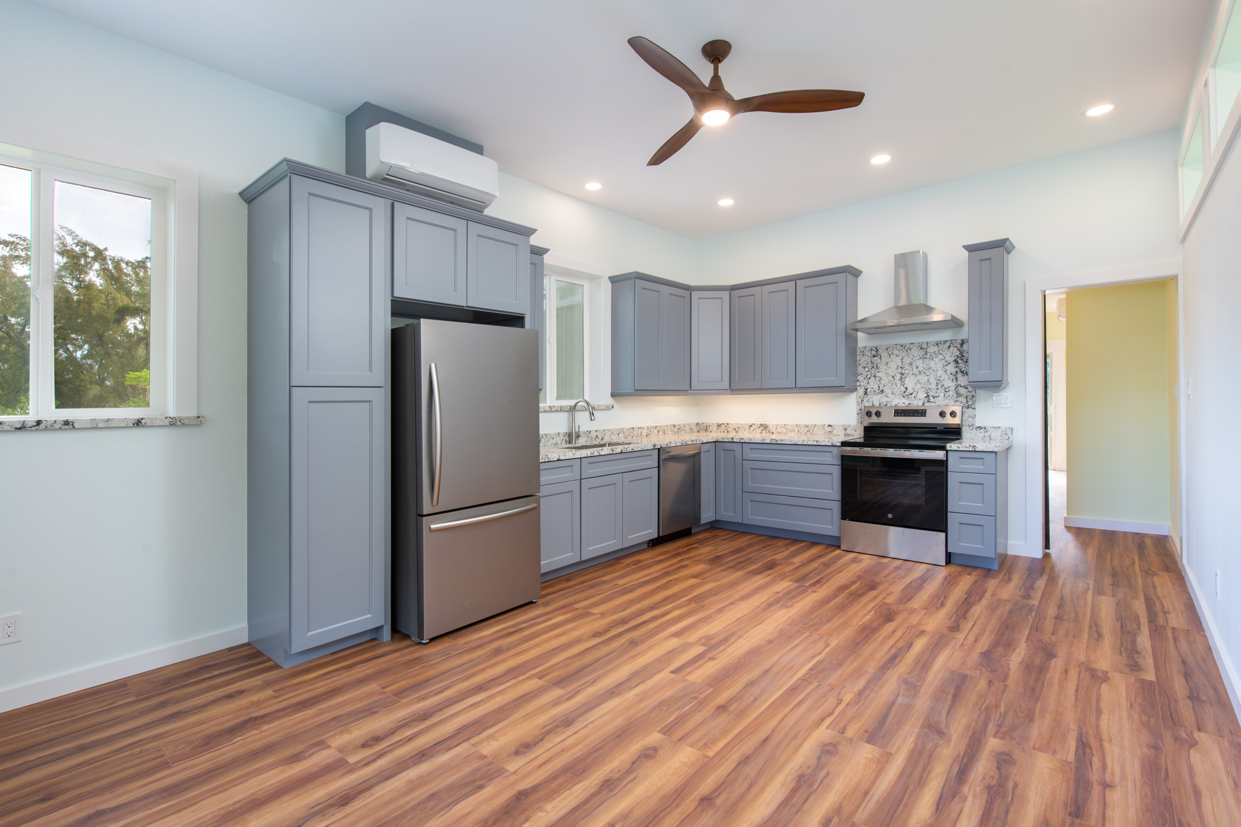 53-4223 Lot 4 Pratt Road Kapaau, HI 96755 - Photo 5 of 30 a kitchen with stainless steel appliances granite countertop a refrigerator a sink a stove and oven