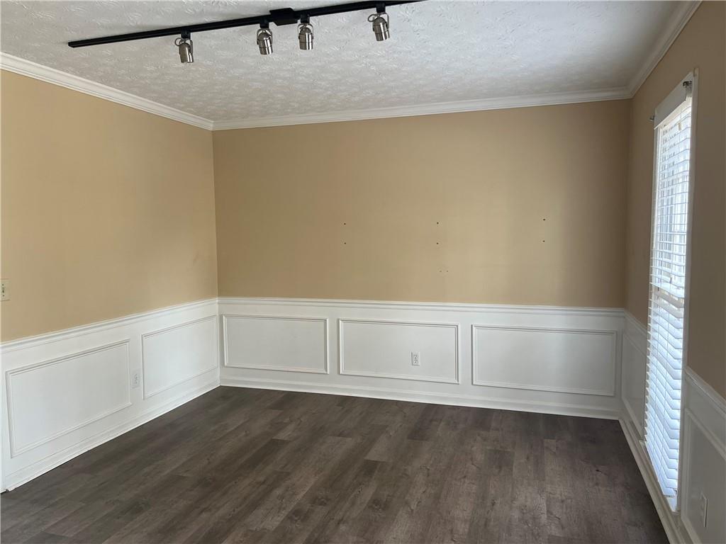 1725 Spindle Top Court Southwest Lilburn, GA 30047 - Photo 5 of 30 a view of an empty walk in closet