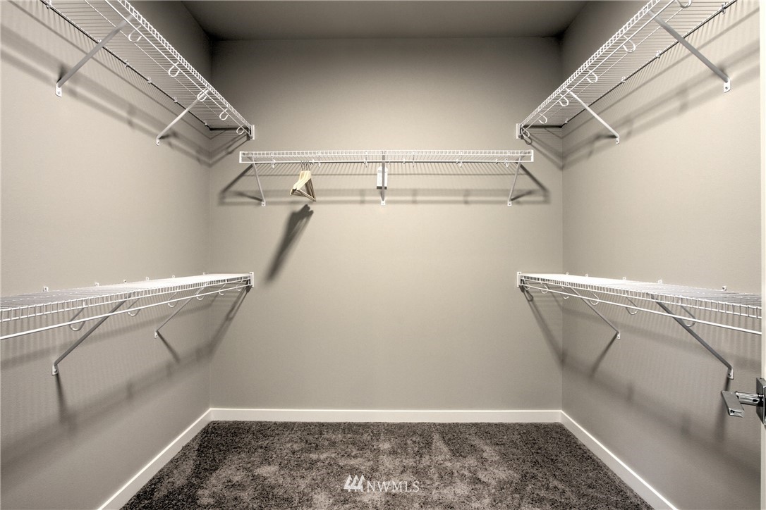 3304 Creswell Road, Unit 11 Snohomish, WA 98290 - Photo 15 of 18 a view of a room with racks on the wall