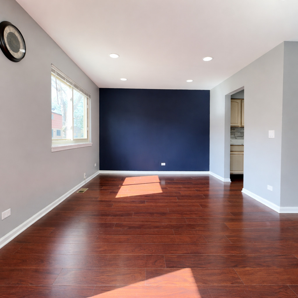 1527 Mohawk Trail Wheeling, IL 60090 - Photo 6 of 21 a view of empty room with wooden floor
