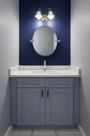 a sink with a mirror