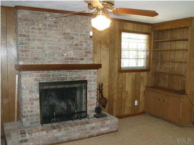 6000 Drexel Road Pensacola, FL 32504 - Photo 8 of 19 brick fireplace in den