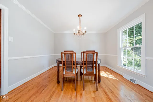 a kitchen with stainless steel appliances granite countertop a sink a stove and a microwave oven