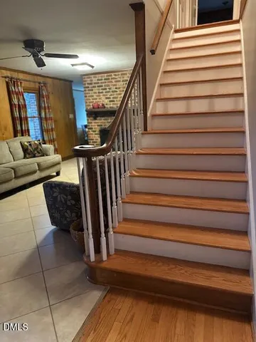 a spacious bathroom with a shower and a sink