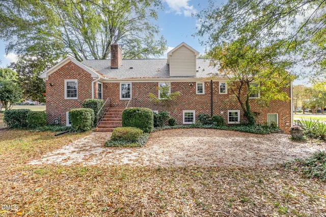 a view of backyard of green space