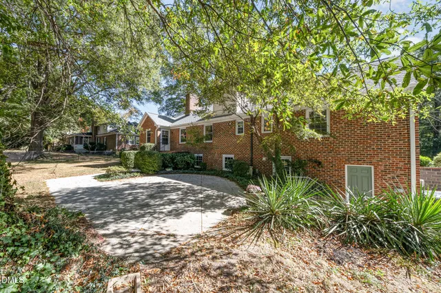 view of a house with a yard