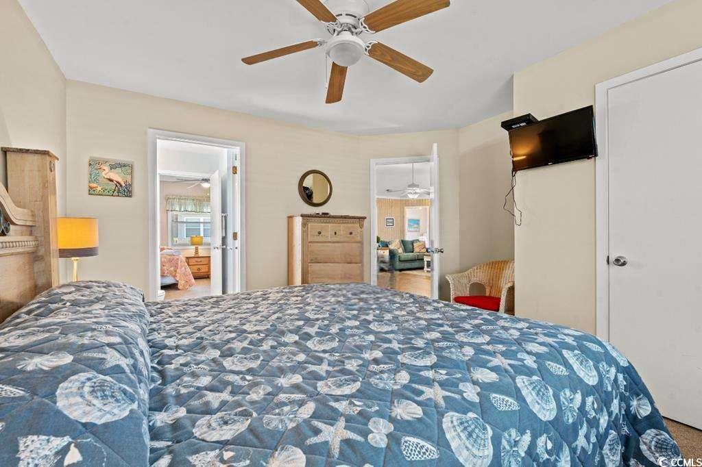 9500 Queens Court Myrtle Beach, SC 29572 - Photo 12 of 33 Bedroom with a ceiling fan