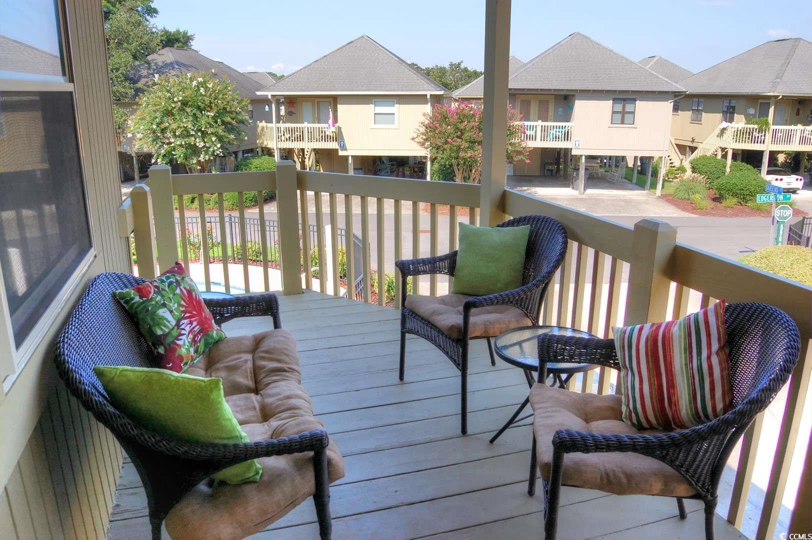 9500 Queens Court Myrtle Beach, SC 29572 - Photo 2 of 33 Wooden deck with a residential view