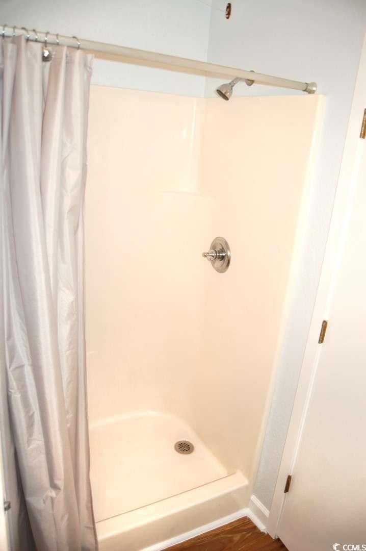 9500 Queens Court Myrtle Beach, SC 29572 - Photo 21 of 33 Full bathroom featuring a shower stall