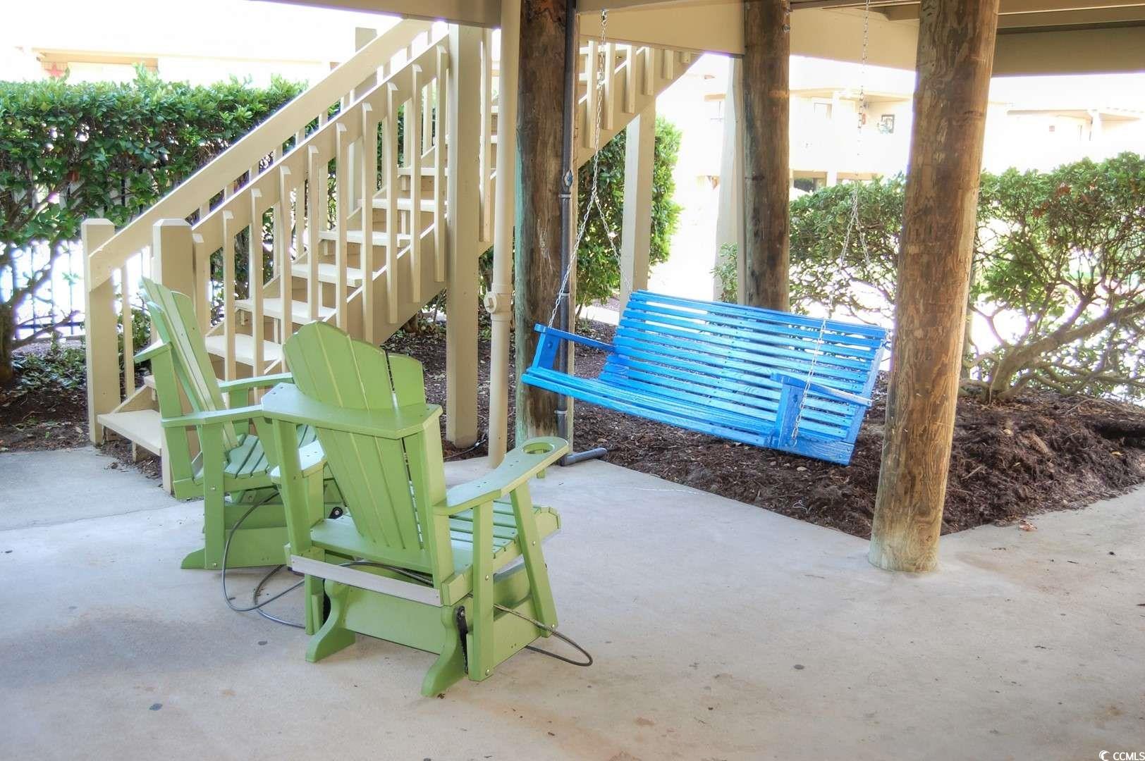9500 Queens Court Myrtle Beach, SC 29572 - Photo 24 of 33 View of patio / terrace featuring stairway