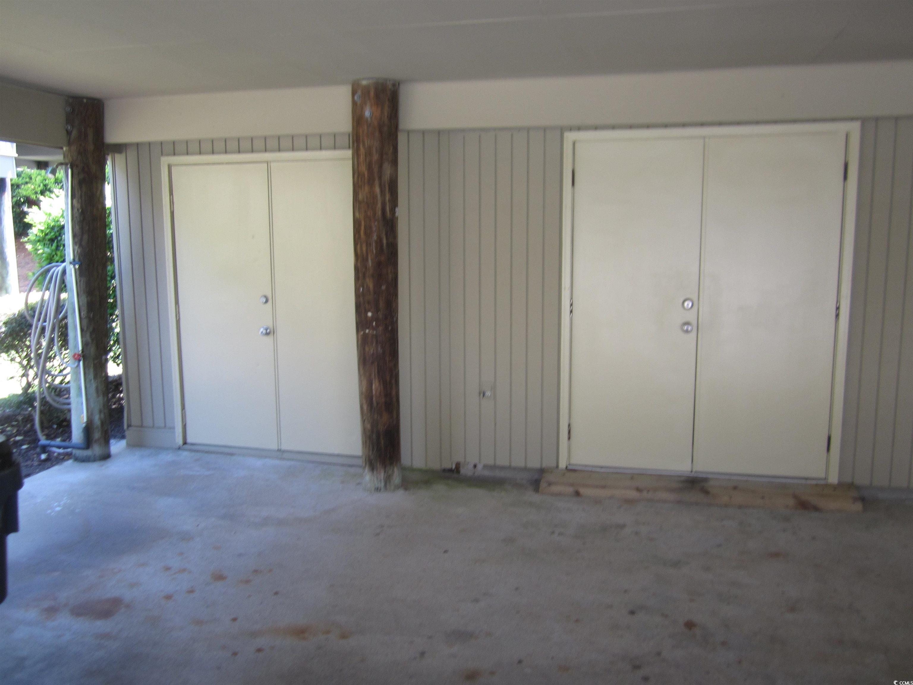 9500 Queens Court Myrtle Beach, SC 29572 - Photo 29 of 33 View of garage