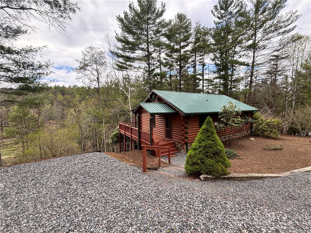 150 Turkey Ridge Crumpler, NC 28617 - Photo 12 of 40 a backyard of a house with table and chairs