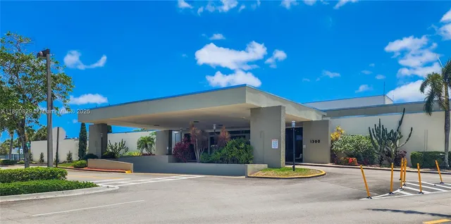 a view of a house with a street