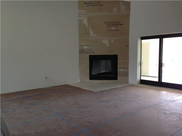 5050 Hancock Road Southwest Ranches, FL 33330 - Photo 8 of 13 an empty room with a fireplace