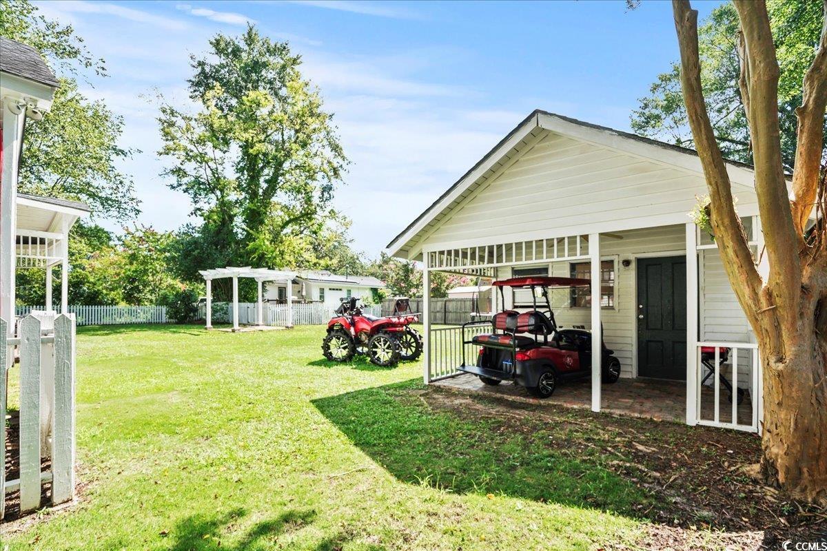 818 Evans Road Marion, SC 29571 - Photo 37 of 39 View of yard featuring a carport