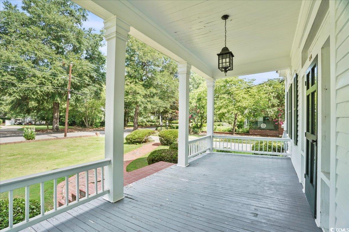 818 Evans Road Marion, SC 29571 - Photo 6 of 39 Wooden porch featuring a yard