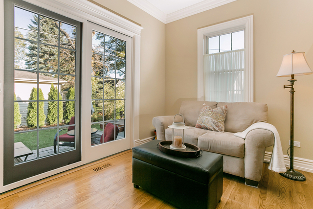 4553 Wolf Road Western Springs, IL 60558 - Photo 13 of 35 a living room with furniture and a floor to ceiling window