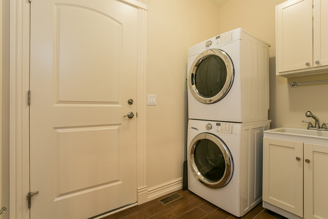 4553 Wolf Road Western Springs, IL 60558 - Photo 18 of 35 a utility room with sink dryer and washer