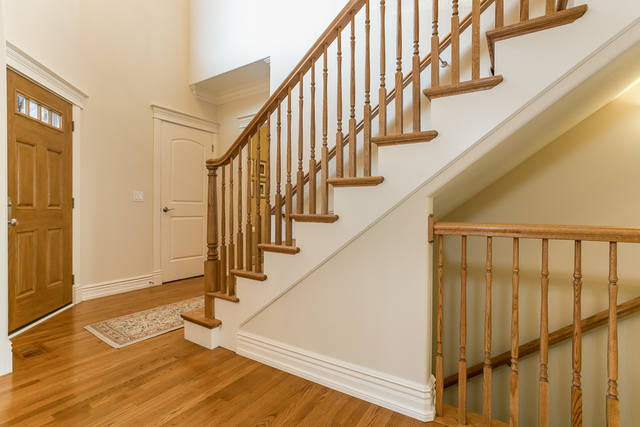 4553 Wolf Road Western Springs, IL 60558 - Photo 32 of 35 a view of staircase with wooden floor and white walls