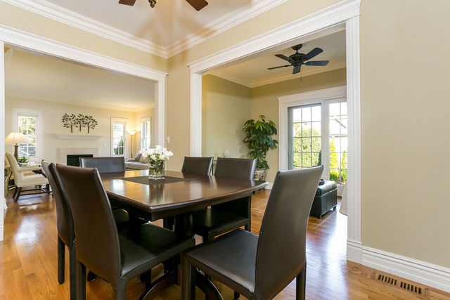 4553 Wolf Road Western Springs, IL 60558 - Photo 10 of 35 a view of a dining room with furniture and wooden floor