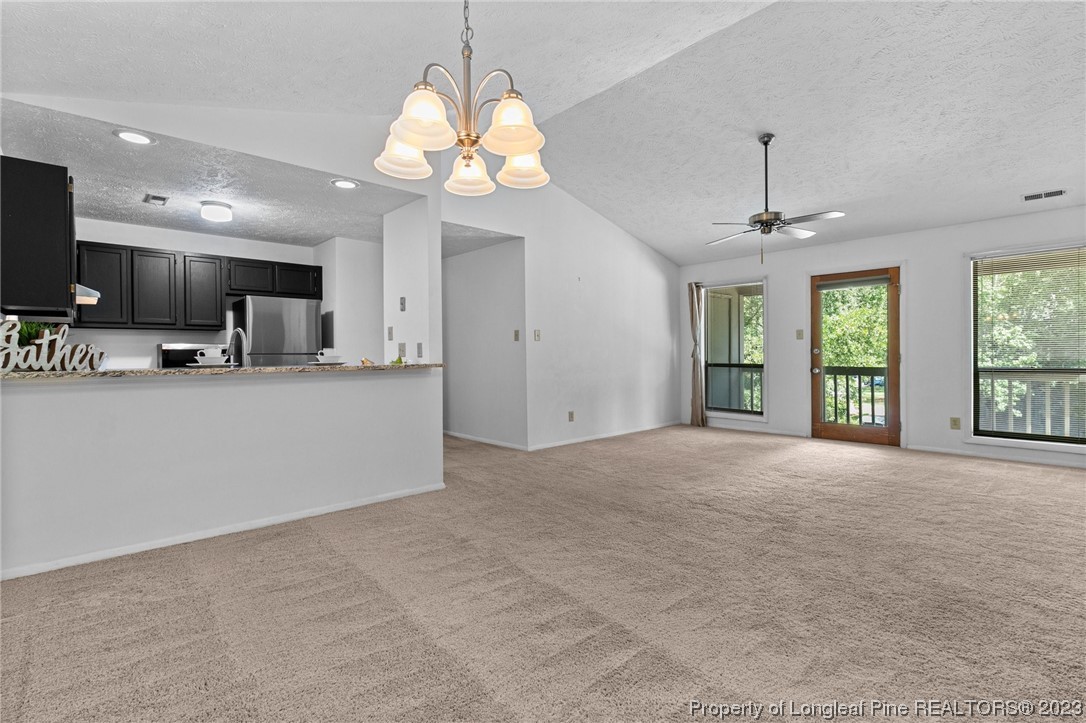 1899 Tryon Drive, Unit 8 Fayetteville, NC 28303 - Photo 11 of 25 a view of a livingroom with a kitchen island
