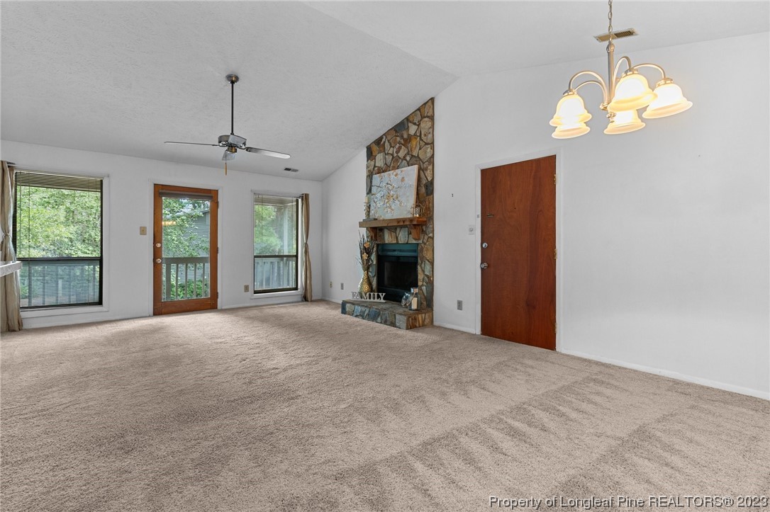1899 Tryon Drive, Unit 8 Fayetteville, NC 28303 - Photo 15 of 25 a view of an empty room with a chandelier