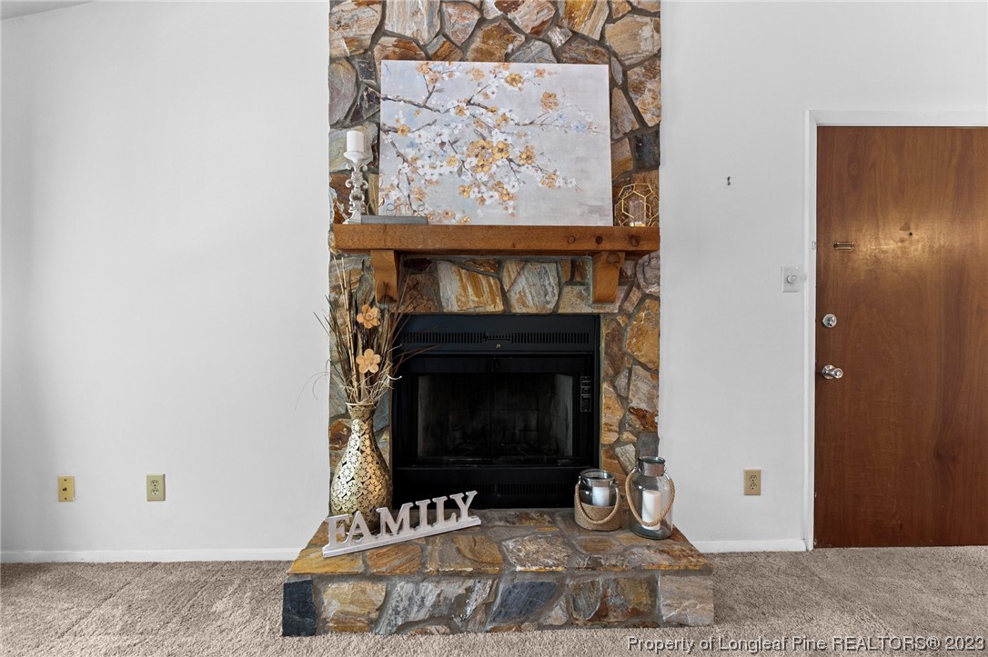 1899 Tryon Drive, Unit 8 Fayetteville, NC 28303 - Photo 8 of 25 a living room with a fireplace