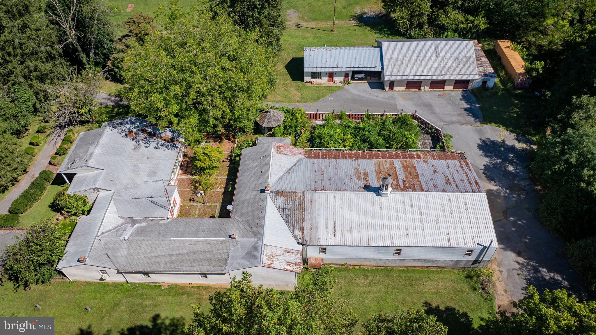 2148 Delmar Orchard Road Martinsburg, WV 25403 - Photo 11 of 22 an aerial view of a house with garden space and street view