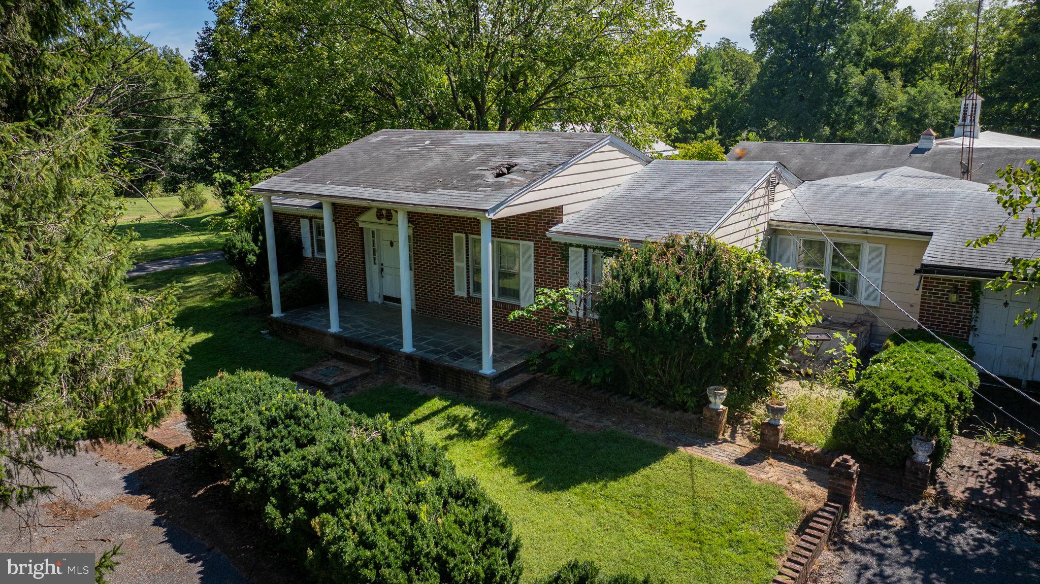 2148 Delmar Orchard Road Martinsburg, WV 25403 - Photo 13 of 22 front view of a house with a yard