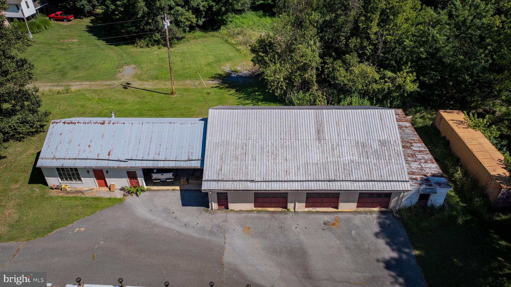 2148 Delmar Orchard Road Martinsburg, WV 25403 - Photo 19 of 22 an aerial view of a house with swimming pool and garden