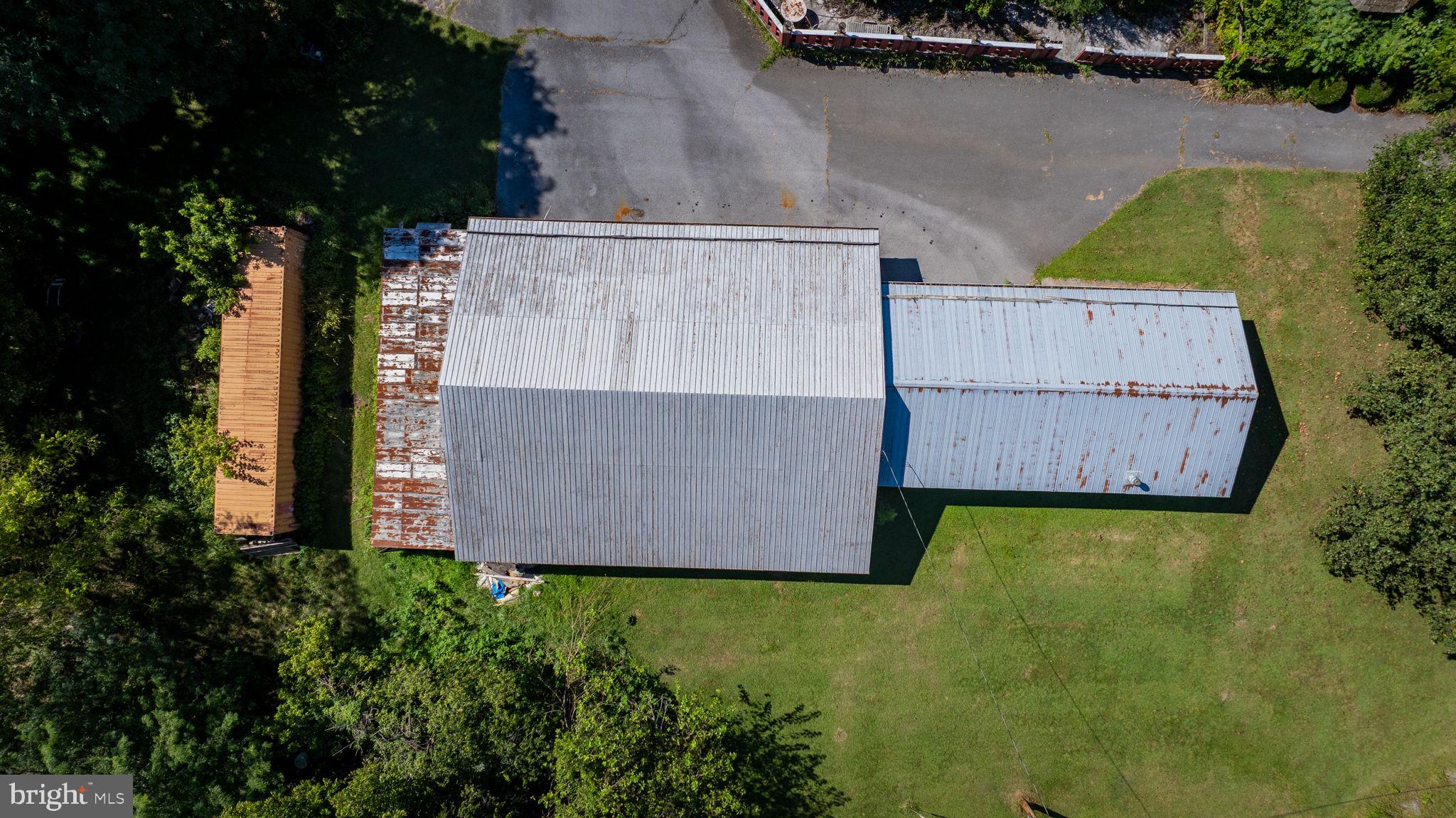 2148 Delmar Orchard Road Martinsburg, WV 25403 - Photo 21 of 22 an aerial view of a house with pool and garden