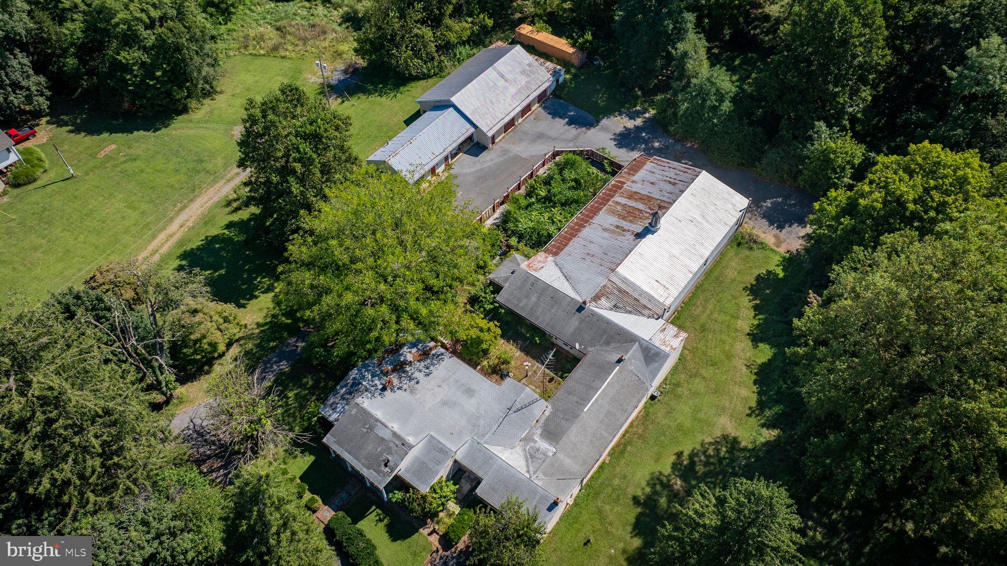 2148 Delmar Orchard Road Martinsburg, WV 25403 - Photo 3 of 22 an aerial view of a house with outdoor space and street view