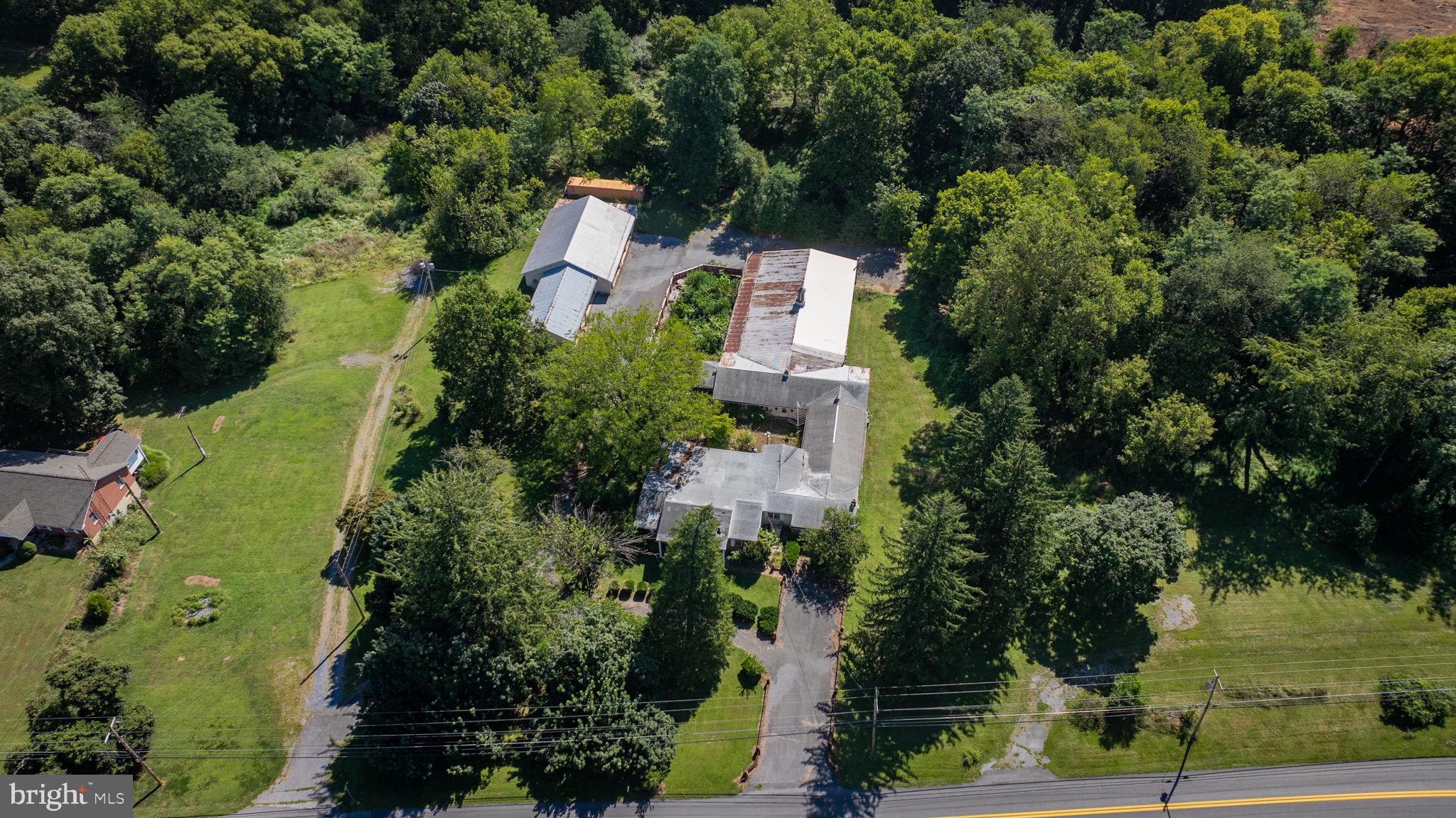 2148 Delmar Orchard Road Martinsburg, WV 25403 - Photo 5 of 22 an aerial view of a house with outdoor space