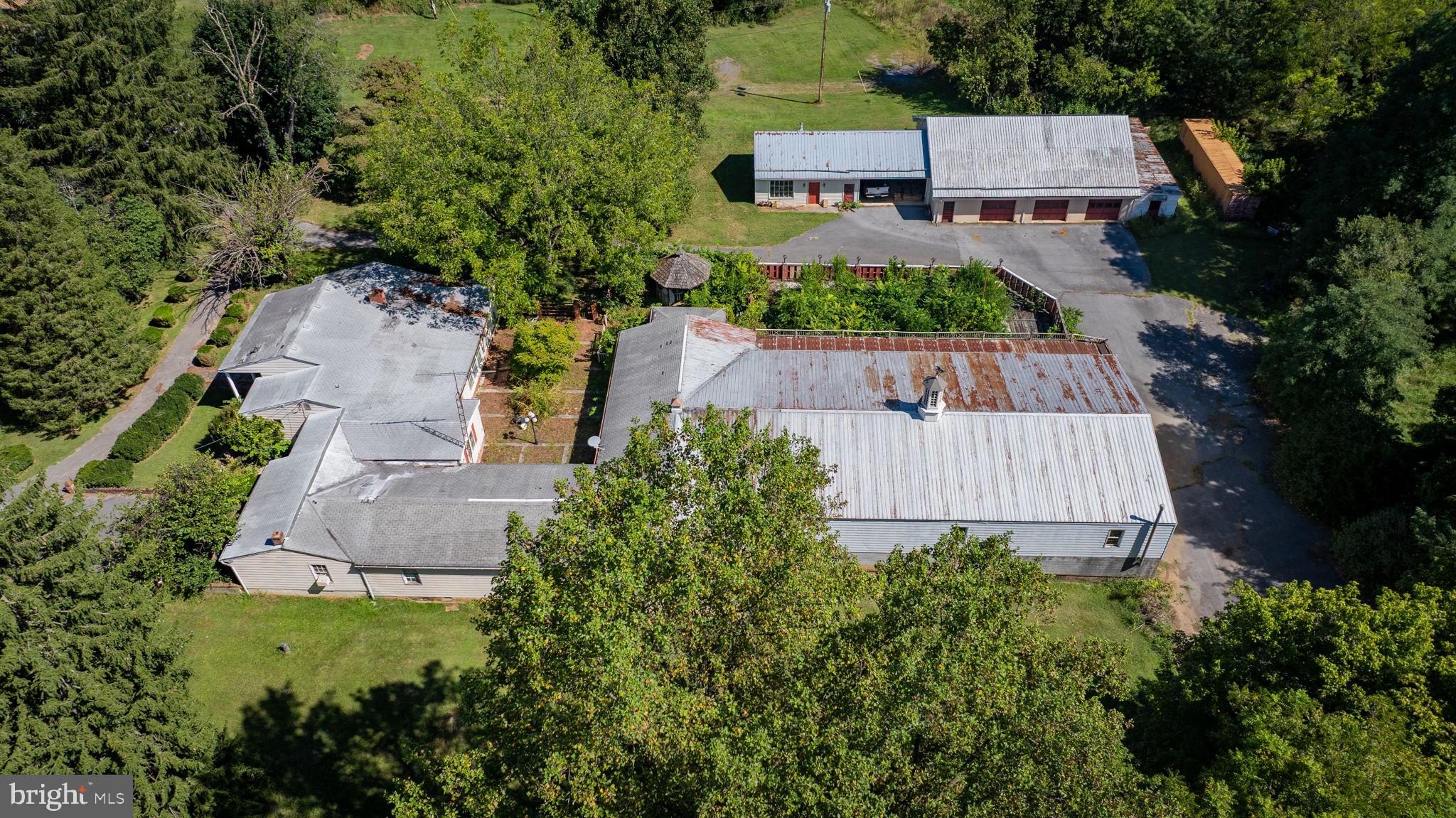 2148 Delmar Orchard Road Martinsburg, WV 25403 - Photo 10 of 22 an aerial view of a house with garden space and street view