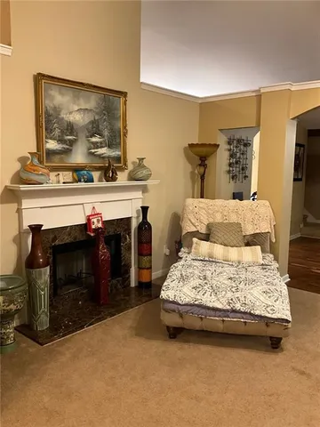 a bedroom with a bed and a fireplace