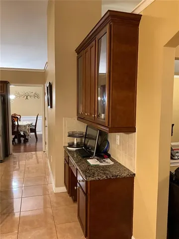 a kitchen with stainless steel appliances granite countertop a stove and a sink