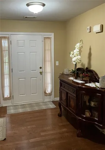 a kitchen with a stove and cabinets