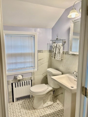 50 Colonial Road Hingham, MA 02043 - Photo 20 of 24 a bathroom with a toilet a sink and a shower