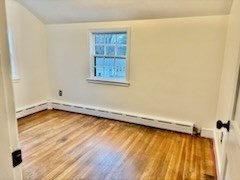 50 Colonial Road Hingham, MA 02043 - Photo 21 of 24 a view of a room with wooden floor and a window