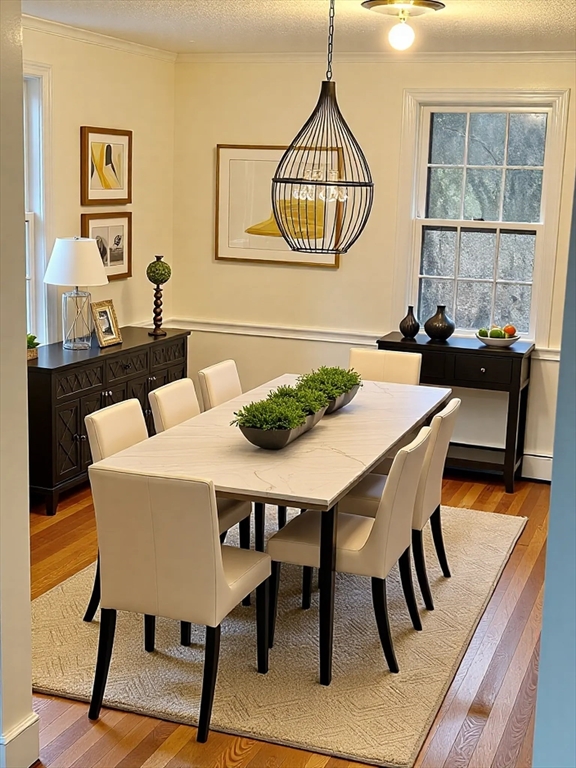 50 Colonial Road Hingham, MA 02043 - Photo 5 of 24 a view of a dining room with furniture window and wooden floor