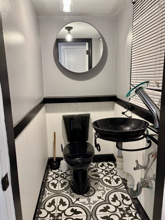 50 Colonial Road Hingham, MA 02043 - Photo 10 of 24 a close view of a stove and a table in a patio