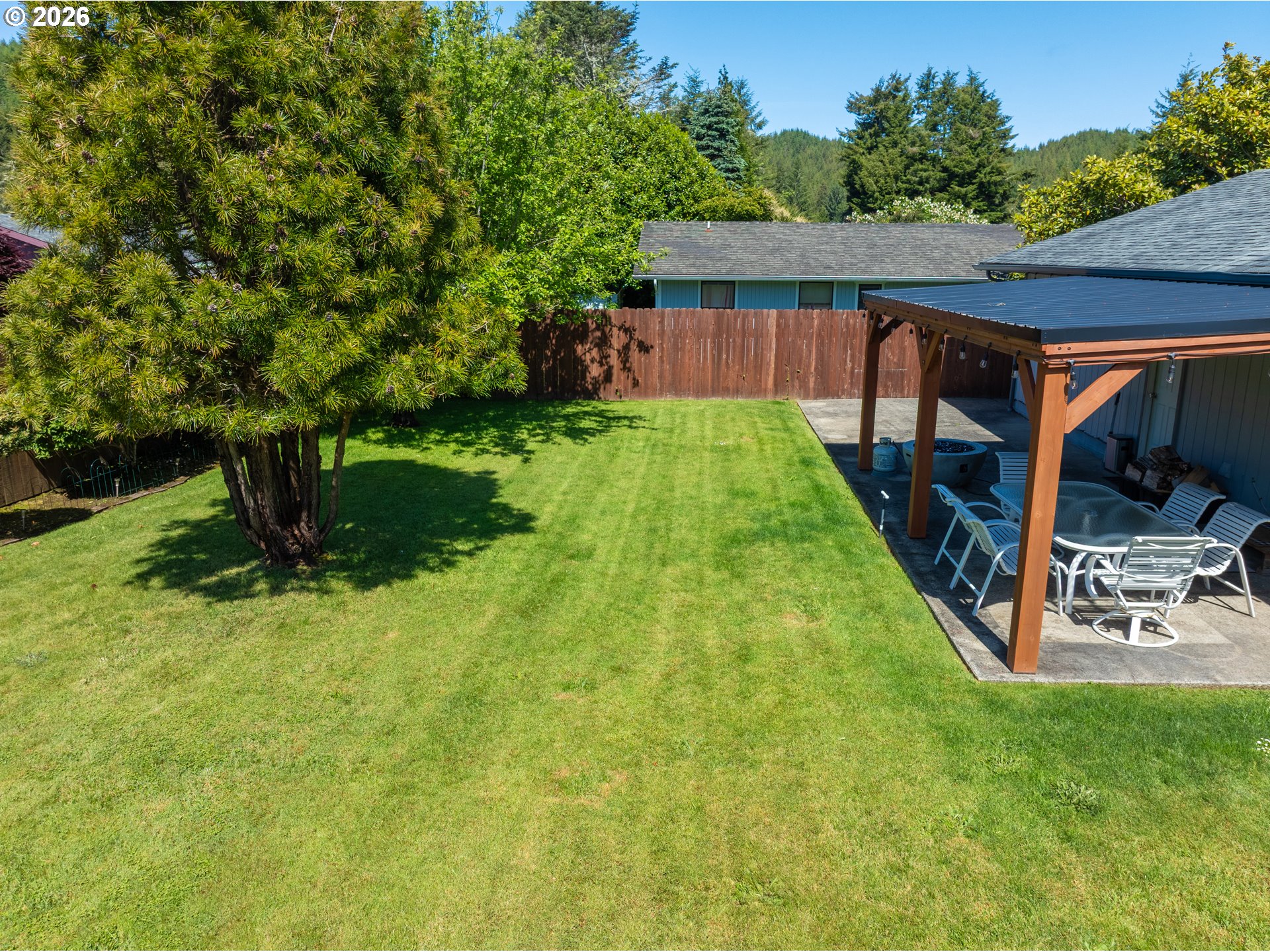 412 Camellia Court Reedsport, OR 97467 - Photo 45 of 48 a view of a backyard