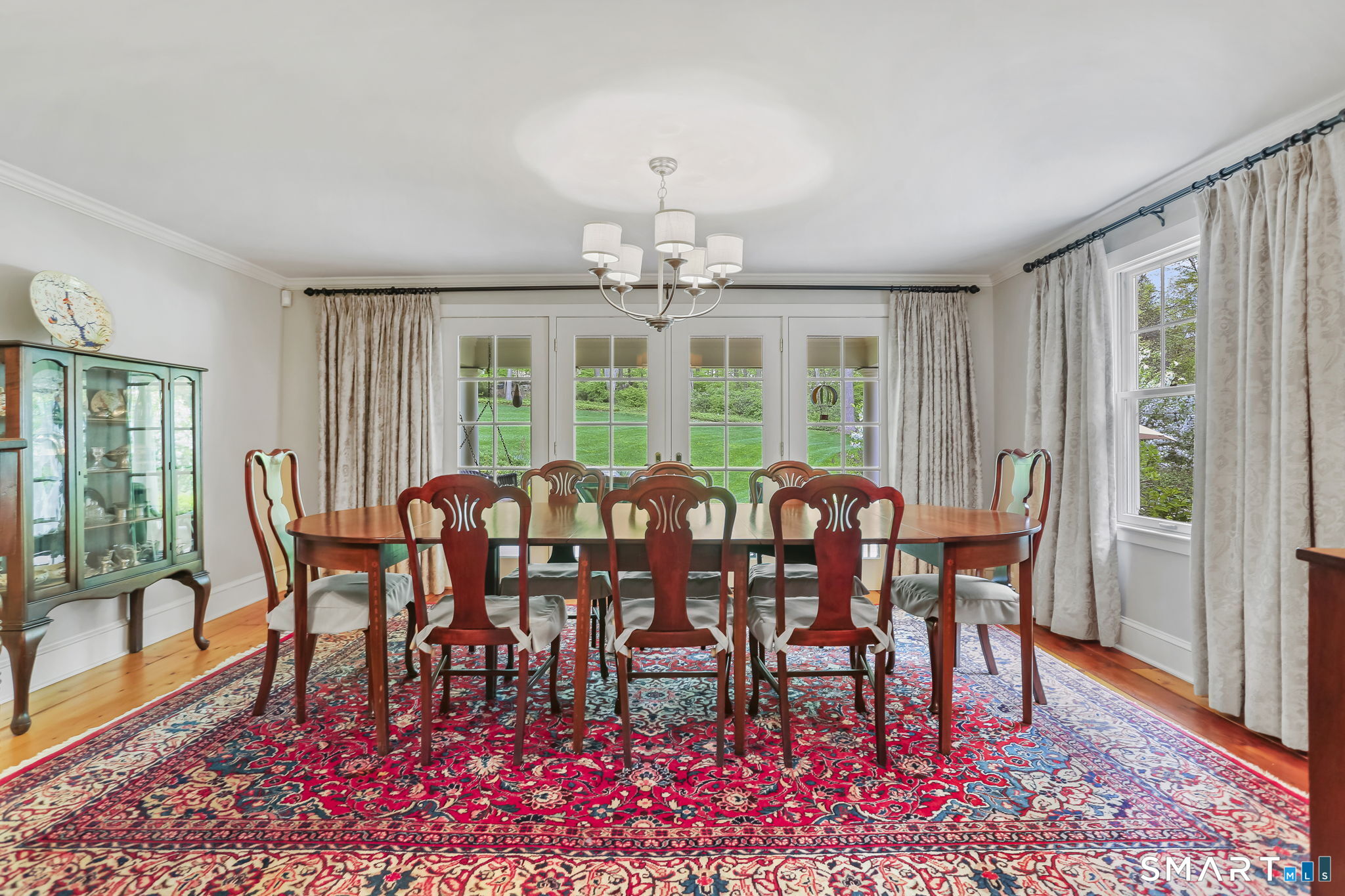 23 Old Stage Coach Road Weston, CT 06883 - Photo 8 of 37 a view of a dining room with furniture window and wooden floor