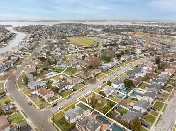 an aerial view of residential building with parking space