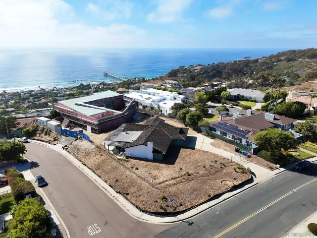 an aerial view of a house with a garden view