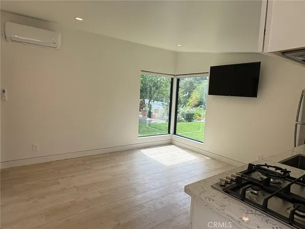 a view of a livingroom with a flat screen tv