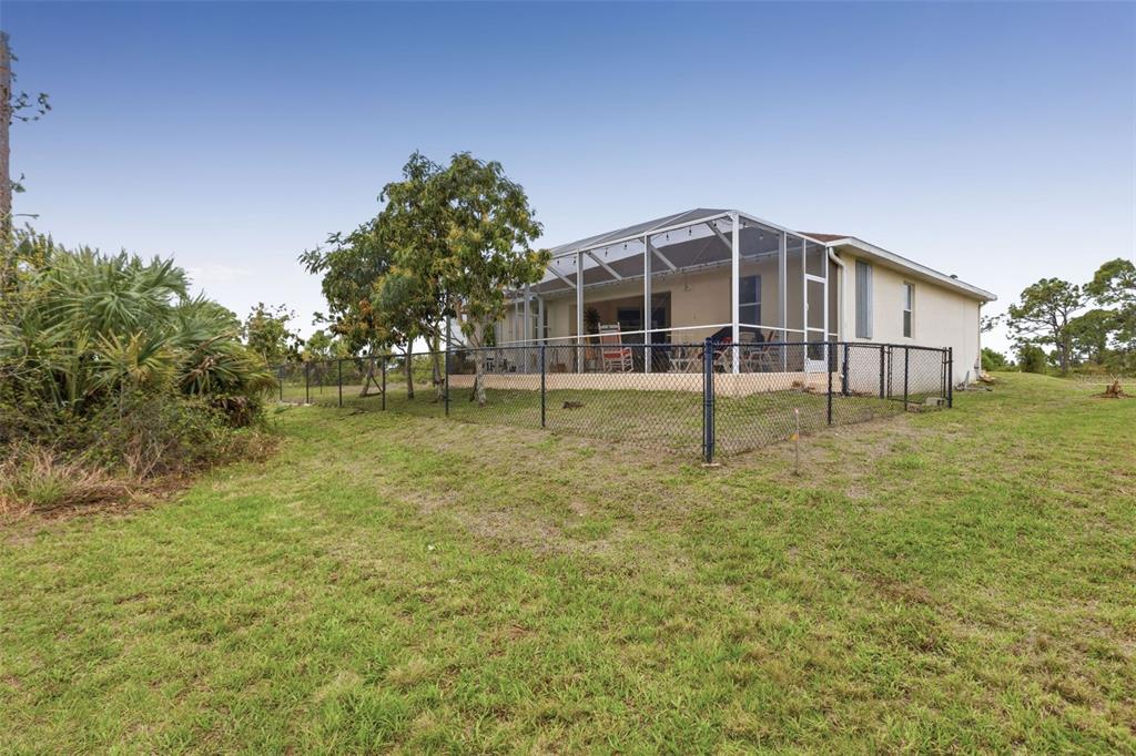 145 Brig Circle East Placida, FL 33946 - Photo 12 of 44 a view of a house with a yard