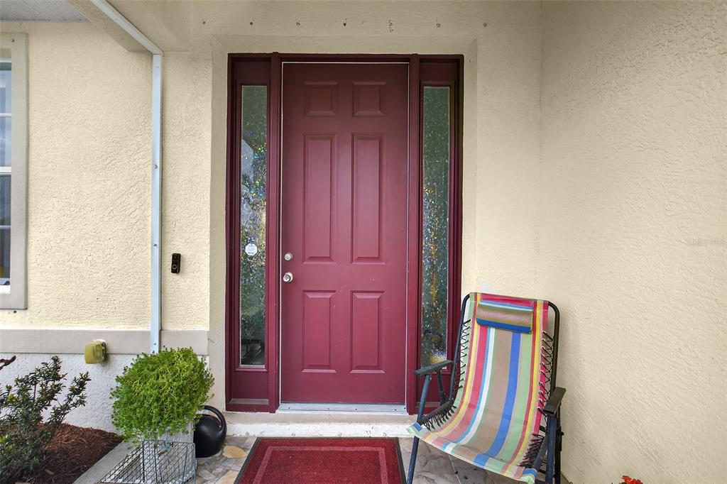 145 Brig Circle East Placida, FL 33946 - Photo 13 of 44 a view of a hallway with furniture and a potted plant