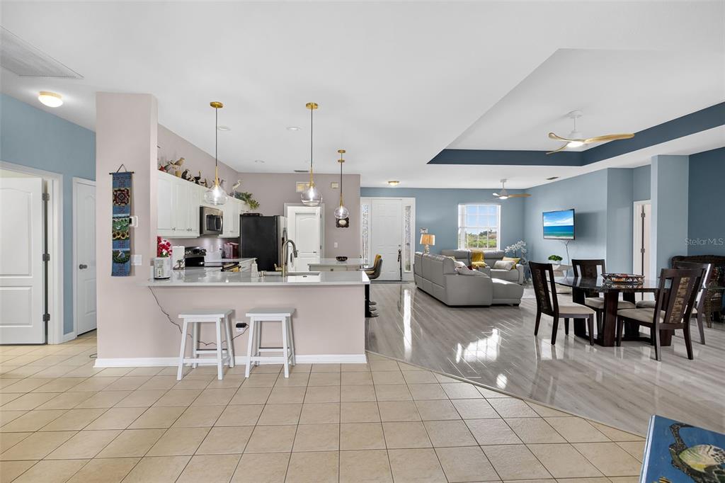 145 Brig Circle East Placida, FL 33946 - Photo 14 of 44 a large kitchen with a table and chairs